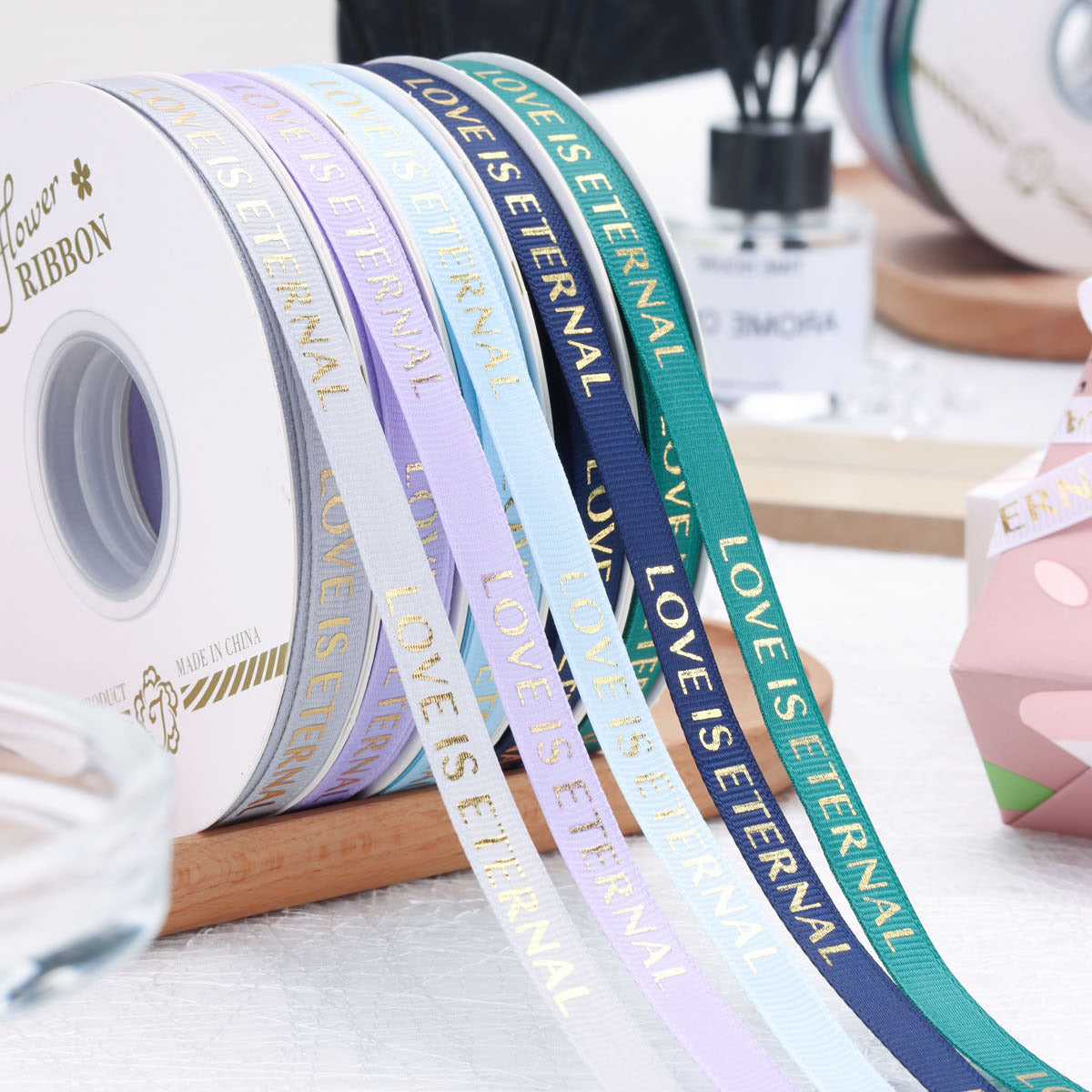 Атласная лента с золотым тиснением «Love is Eternal»